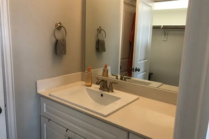 Shared bathroom vanity and mirror