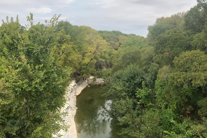 Creek and greenbelt running through the community