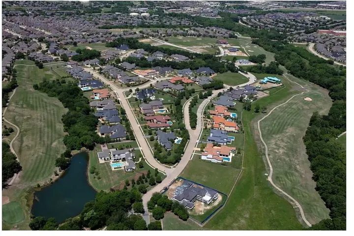 Aerial view of the golf-course community and lake