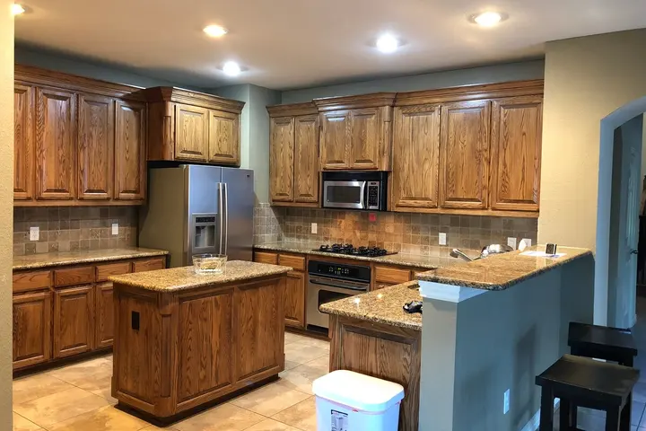 Kitchen with granite counters and stainless appliances